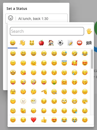 The Set a Status box with the emoji picker open and a sample status message